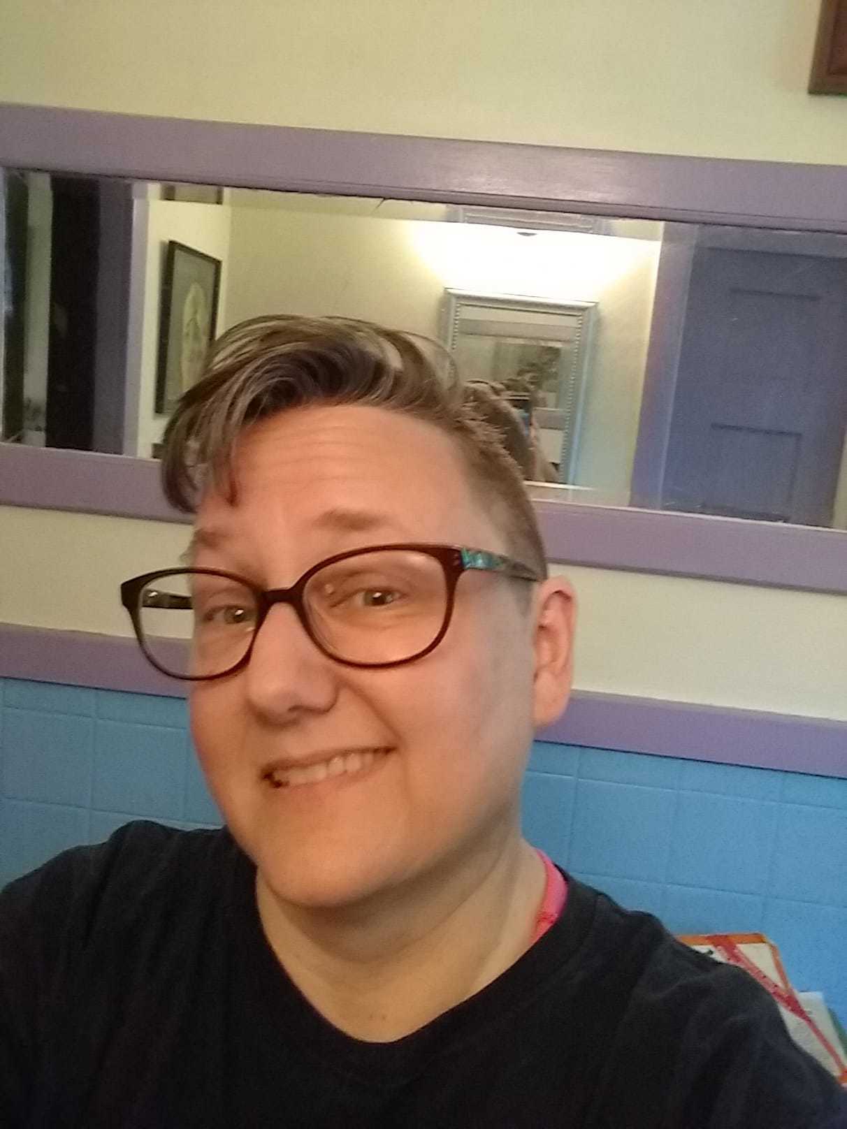 Lyda's fancy hair and fancy new glasses