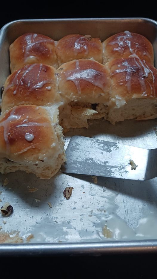 homemade hot-cross buns (half-eaten tray)