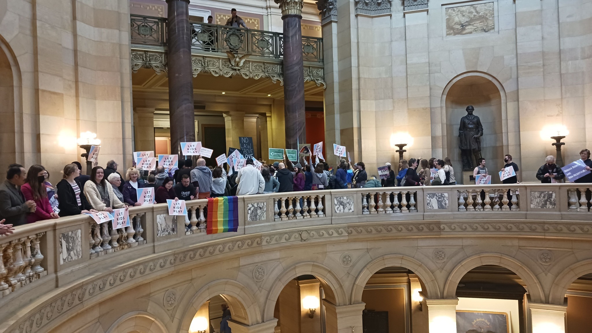 protestors at the capitol building for trans rights